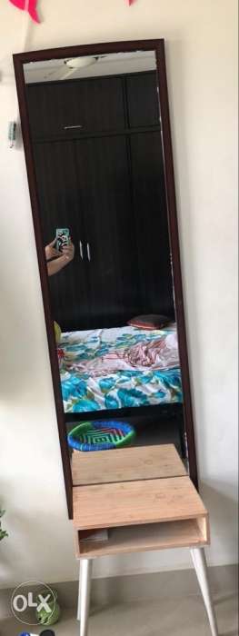 6feet mirror with a table