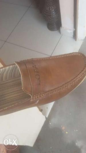 A pair of loafer bought from delhi size 10 no hai
