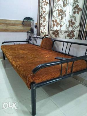 All metal sofa with printed seat.