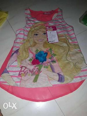 BUY 15 TShirt MIXED SIZE Of barbie between 2 to 8 yrs STOCK