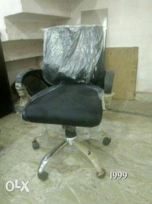 Black And Gray Rolling Armchair