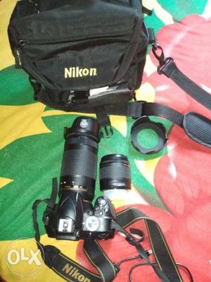 Black And Green DSLR Camera With Bag