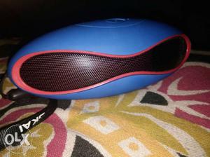 Black and blue speaker with bluetooth