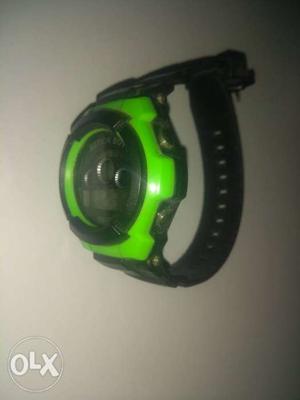 Black and green attractive hand watch