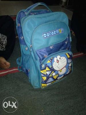 Blue And Green Backpack With Bag