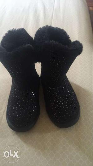 Brand new black boots with silver sparkles.