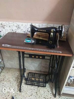Brown And Black Treadle Sewing Machine