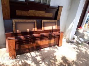 Brown Wooden Framed bed