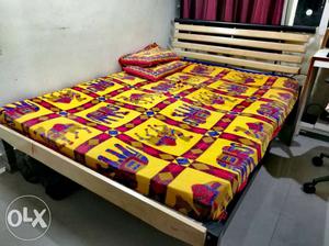 Iron bed with mattress in good condition.