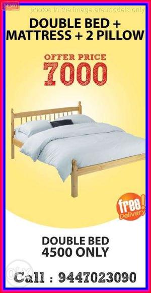 New wooden double cot + mattress with pillow .