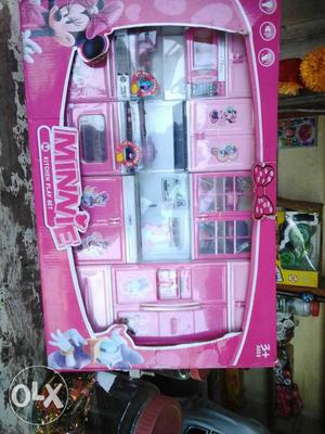 Pink And White Plastic Dollhouse