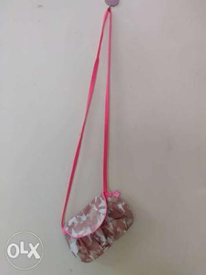 Small cute pink sling bag from BE FOR BAG.