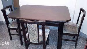 Strong teak wood table with three chairs