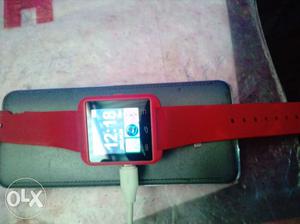 Stylish red screen touch watch at good condition