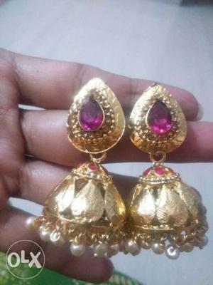 Two Gold-colored And Purple Gemstone Earrings