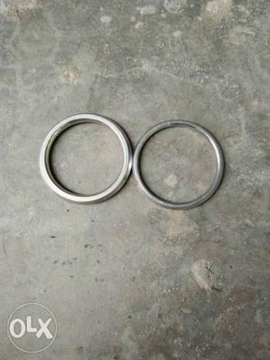 Two Round Silver-colored Frames