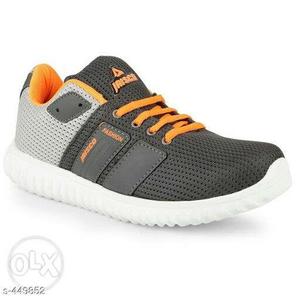 Unpaired Gray And Orange Running Shoe
