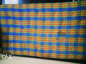 Yellow, Blue, And Red Plaid Textile