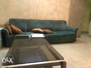 4 seater sofa and wooden center table no bargain