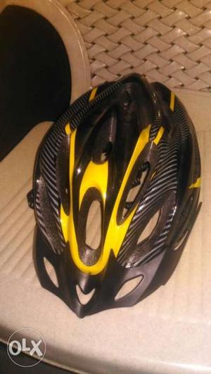 Black And Yellow Bicycle Helmet