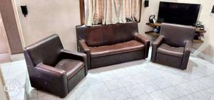 Brown Leather Sofa with two leather chairs