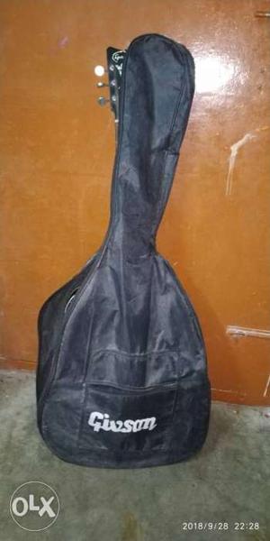 Givsan Black guitar for learners, in good working condition.