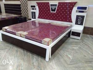 It is a fresh pic in walnut new double bed With