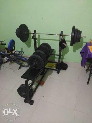 Rubber dumbal of 45 kg of long rod with bench 20