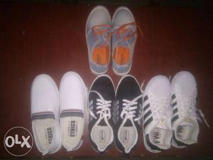 4 pair of shoes. 1) white loafer 2)black casual