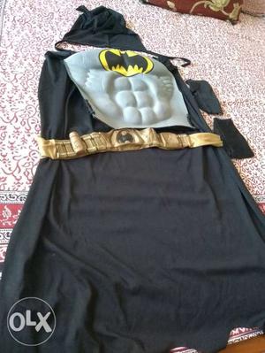 A Batman dress with the mask n hand gloves for