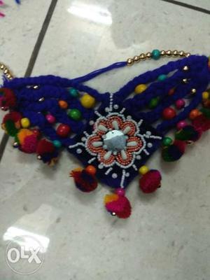 Blue, Red, And Green Beaded Bracelet
