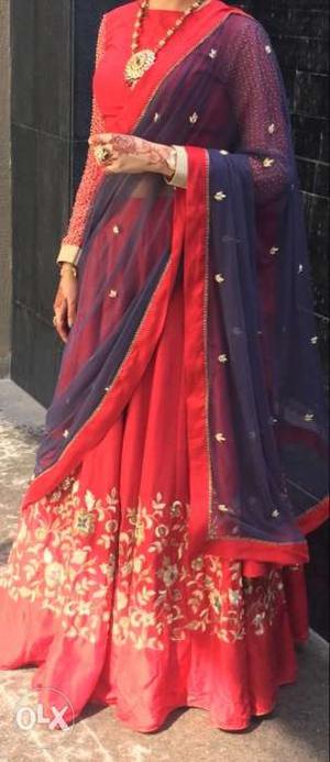 Lehenga with dupatta and blouse with price tag.