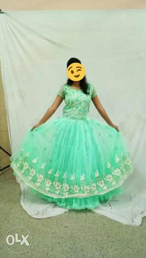 Once used Green colour Gown at low price