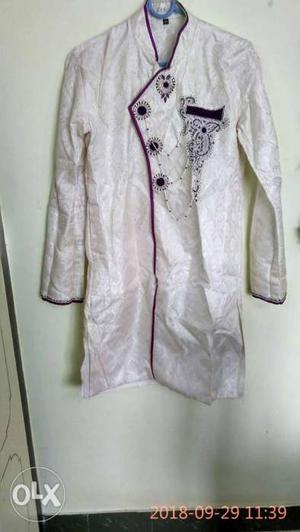 One time used sherwani.. White and Purple.. 34 size