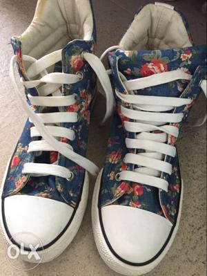 Pair Of Blue-and-white High Top Sneakers