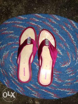 Pair Of Red-and-blue Flip Flops