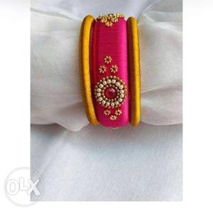 Red And Gold-colored Bracelet