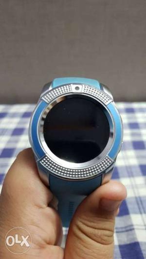 Round Silver-colored Digital Watch With Blue Strap