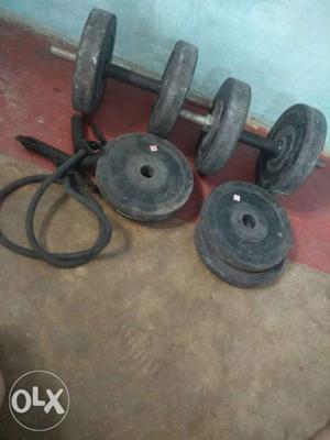 Gym dumbles with 20 kg weight and an expander the market