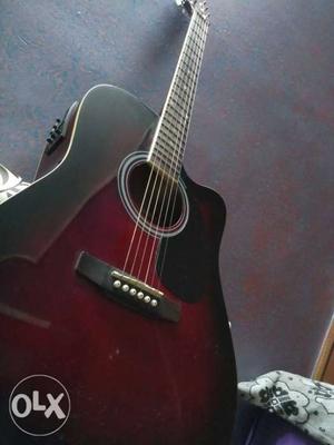 Kaps semi acoustic guitar reddish black colour