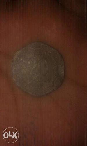 Round silver colour 20paisa coin
