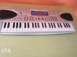 White And Black Electronic Keyboard