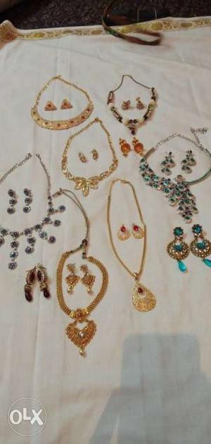 7 necklace sets and 3 earrings pairs jewellery