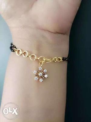 Gold-colored Clear Gemstone Encrusted Snowflake Bracelet