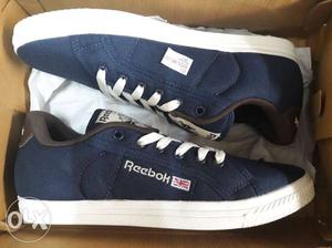 Pair Of Blue-and-white Reebok Sneakers shoes brand new