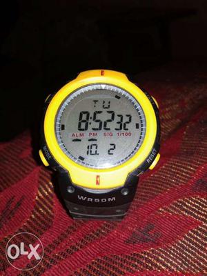 Round Gold-colored Digital Watch With Black Strap