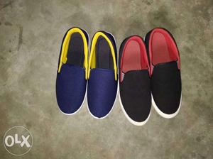 Two Pairs Of Black And Red Slip-on Shoes