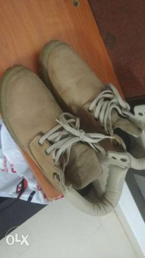 Wood land shoes original rate .. not used at
