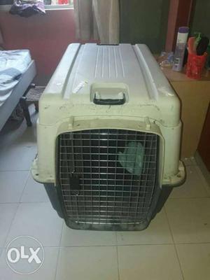 White and black pet carrier cage
