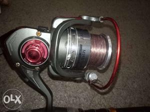 Black And Red Fishing Reel
